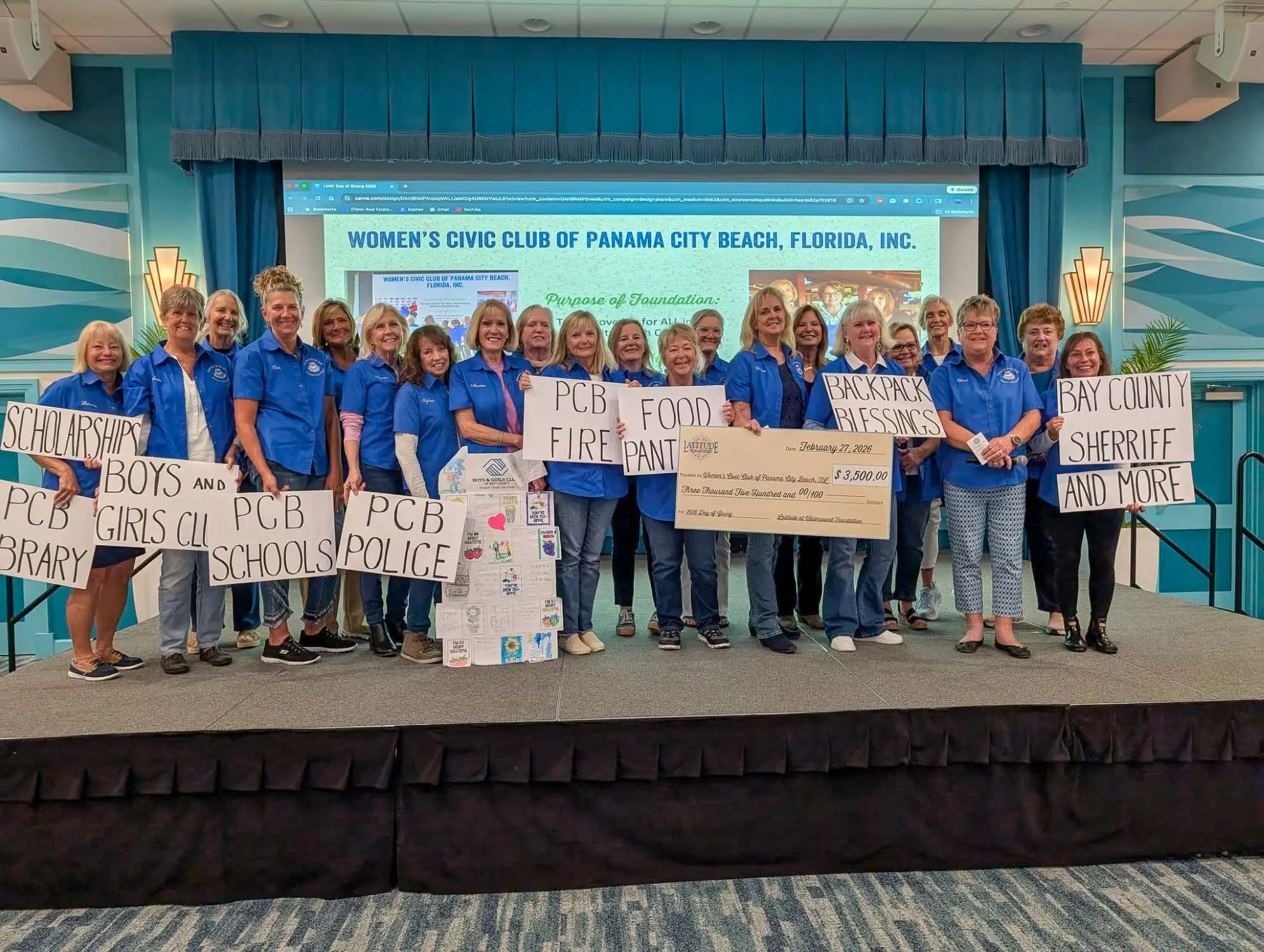 Women’s Civic Club members receiving an award at Latitude Margaritaville Watersound.
