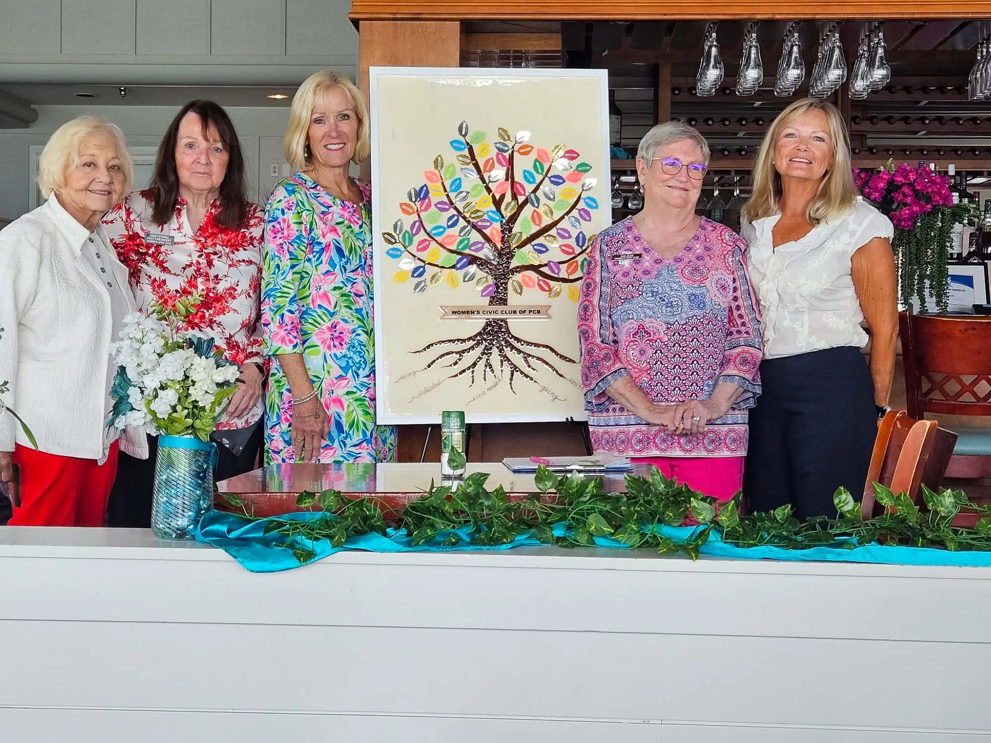 Women’s Civic Club members recognized for membership milestones and years of service.