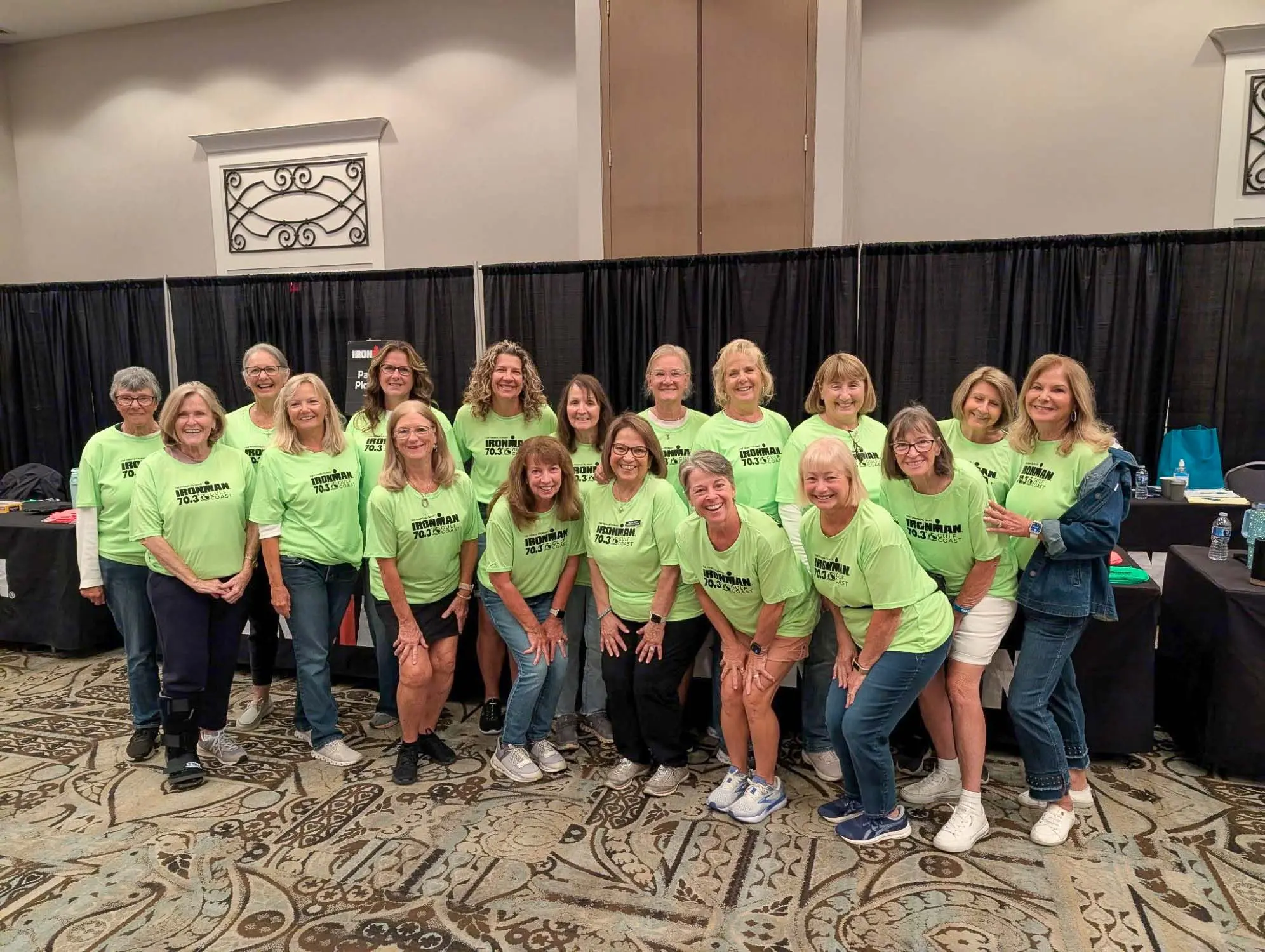 Women’s Civic Club members raising funds while supporting an Ironman event in Panama City Beach.