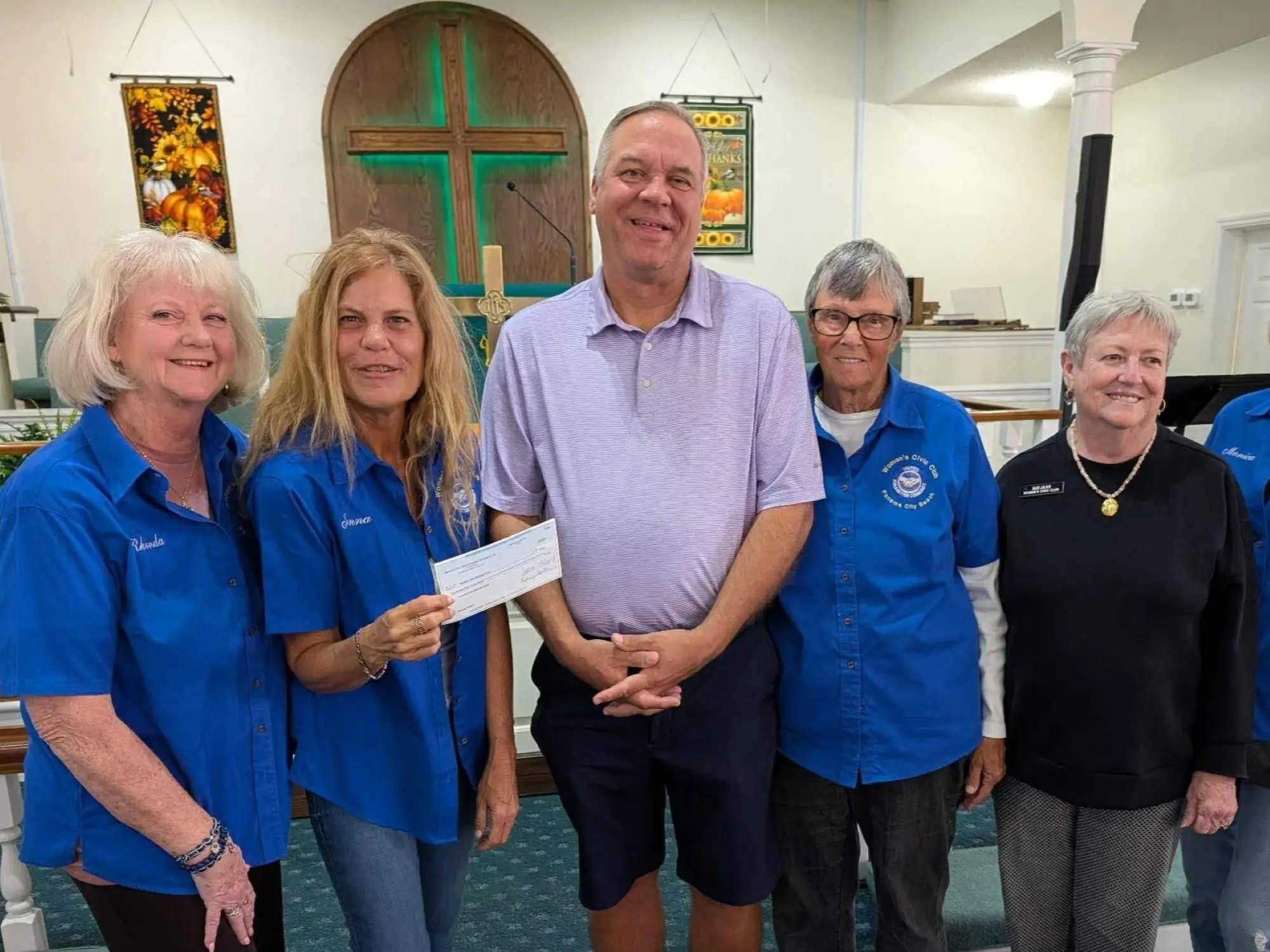Women’s Civic Club of Panama City Beach members presenting a donation to Gulfview United Methodist Church in support of its Domestic Violence Program.